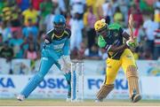 31 July 2016; Andre Russell hits down the ground during Match 30 of the Hero Caribbean Premier League match between Jamaica Tallawahs v St Lucia Zouks at Central Broward Stadium in Lauderhill, Florida, United States of America. Photo Ashley Allen/Sportsfile