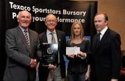 30 September 2010; Presenting Charlie O'Neill and Ali Loughney of Donore Harriers A.C. Chaplelizod, Dublin, with their award at the 2010 Texaco Sportstars Bursaries Awards Presentation are Eddie Keher, left, and Enda Riney, right, Country Chairman of Chevron Ireland. Conrad Hotel, Earlsfort Terrace, Dublin. Picture credit: Barry Cregg / SPORTSFILE