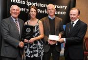 30 September 2010; Presenting Carmel Kelly and Gerry Robinson of St. Cocas A.C., Kilcock, Co. Kildare, with their award at the 2010 Texaco Sportstars Bursaries Awards Presentation are Eddie Keher, left, and Enda Riney, right, Country Chairman of Chevron Ireland. Conrad Hotel, Earlsfort Terrace, Dublin. Picture credit: Barry Cregg / SPORTSFILE