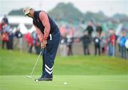 30 September 2010; Tiger Woods, Team USA, watches his birdie putt on the first green. 2010 Ryder Cup - Practice Day, The Celtic Manor Resort, City of Newport, Wales. Picture credit: Matt Browne / SPORTSFILE