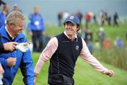 30 September 2010; Rory Mcllroy and captain Colin Montgomerie, Team Europe, on the 12th fairway. 2010 Ryder Cup - Practice Day, The Celtic Manor Resort, City of Newport, Wales. Picture credit: Matt Browne / SPORTSFILE