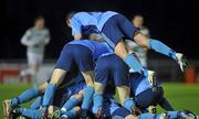 1 October 2010; UCD players celebrate after Keith Ward, hidden, scored his side's third goal. Airtricity League Premier Division, UCD v Shamrock Rovers, Belfield Bowl, UCD, Belfield, Dublin. Picture credit: David Maher / SPORTSFILE