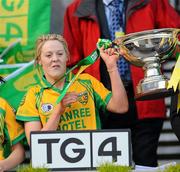 26 September 2010; Yvonne McMonagle, Donegal, lifts the Mary Quinn Memorial Cup TG4 All-Ireland Intermediate Ladies Football Championship Final, Donegal v Waterford, Croke Park, Dublin. Picture credit: Dáire Brennan / SPORTSFILE