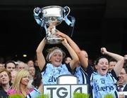 26 September 2010; Gemma Fay, Dublin, lifts the Brendan Martin Cup. TG4 All-Ireland Senior Ladies Football Championship Final, Dublin v Tyrone, Croke Park, Dublin. Picture credit: Dáire Brennan / SPORTSFILE