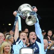 26 September 2010; Dublin players Karen Kennedy, left, lifts the Brendan Martin Cup with her Naomh Mearnóg clubmate Clíodhna O'Connor. TG4 All-Ireland Senior Ladies Football Championship Final, Dublin v Tyrone, Croke Park, Dublin. Picture credit: Dáire Brennan / SPORTSFILE