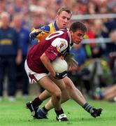 4 August 2001; Matthew Clancy of Galway in action against Michael Ryan of Roscommon during the Bank of Ireland All-Ireland Senior Football Championship Quarter-Final match between Galway and Roscommon at MacHale Park in Castlebar, Mayo. Photo by Aoife Rice/Sportsfile