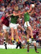5 August 2001; John McDermott of Meath wins a dropping ball ahead of Westmeath's Rory O'Connell and David O'Shaughnessy during the Bank of Ireland All-Ireland Senior Football Championship Quarter-Final match between Meath and Westmeath at Croke Park in Dublin. Photo by Ray McManus/Sportsfile