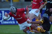 7 August 2001; Alan Quinlan of Munster scores his side's first try despite the tackle of Richard Berkett of London Wasps during the Triangular Tournament match between Munster and London Wasps at Thomond Park in Limerick. Photo by Matt Browne/Sportsfile