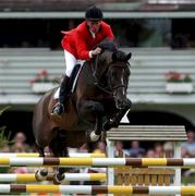 10 August 2001; Ak Caridor Z, with Jos Lansink up, representing Belgium, during the Kerrygold Nations Cup at the Kerrygold Horse Show at the RDS in Dublin. Photo by Damien Eagers/Sportsfile