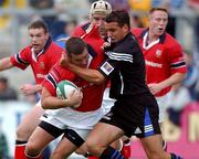 10 August 2001; John Fogarty of Munster is tackled by Tom Voyce of Bath during the Friendly match between Munster and Bath at Thomond Park in Limerick. Photo by Matt Browne/Sportsfile