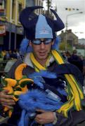 11 August 2001; Flag seller Eddie Sweeney, from Galway, selling merchandise in the Square in Thurles prior to  during the Bank of Ireland All-Ireland Senior Football Championship Quarter-Final Replay match between Dublin and Kerry at Semple Stadium in Thurles, Tipperary. Photo by Ray McManus/Sportsfile
