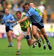11 August 2001; Dara Ó Cinnéide of Kerry is tackled by Ciarán Whelan of Dublin during the Bank of Ireland All-Ireland Senior Football Championship Quarter-Final Replay match between Dublin and Kerry at Semple Stadium in Thurles, Tipperary. Photo by Ray McManus/Sportsfile