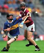 12 August 2001; Francis Devanney of Tipperary in action against Shane Kavanagh of Galway during the All-Ireland Minor Hurling Championship Semi-Final match between Galway and Tipperary at Croke Park in Dublin. Photo by Ray McManus/Sportsfile