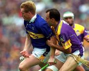 12 August 2001; Declan Ryan of Tipperary in action against Darragh Ryan of Wexford during the Guinness All-Ireland Senior Hurling Championship Semi-Final match between Wexford and Tipperary at Croke Park in Dublin. Photo by Damien Eagers/Sportsfile
