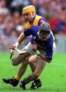 12 August 2001; Thomas Costello of Tipperary in action against Michael Jordan of Wexford during the Guinness All-Ireland Senior Hurling Championship Semi-Final match between Wexford and Tipperary at Croke Park in Dublin. Photo by Damien Eagers/Sportsfile