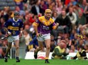 12 August 2001; Michael Jordan of Wexford celebrates scoring his last minute point during the Guinness All-Ireland Senior Hurling Championship Semi-Final match between Wexford and Tipperary at Croke Park in Dublin. Photo by Ray McManus/Sportsfile