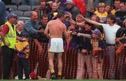 12 August 2001; Larry O'Gorman of Wexford with supporters after the drawn Guinness All-Ireland Senior Hurling Championship Semi-Final match between Wexford and Tipperary at Croke Park in Dublin. Photo by Ray McManus/Sportsfile