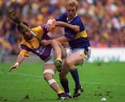 12 August 2001; Darragh Ryan of Wexford is tackled by Declan Ryan of Tipperary during the Guinness All-Ireland Senior Hurling Championship Semi-Final match between Wexford and Tipperary at Croke Park in Dublin. Photo by Damien Eagers/Sportsfile