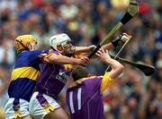 12 August 2001; Paul Codd, Wexford catches the sliotar ahead of Paul Ormonde of Tipperary during the Guinness All-Ireland Senior Hurling Championship Semi-Final match between Wexford and Tipperary at Croke Park in Dublin. Photo by Damien Eagers/Sportsfile