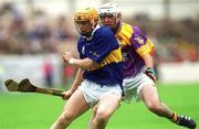 12 August 2001; Paul Ormonde of Tipperary in action against Paul Codd of Wexford during the Guinness All-Ireland Senior Hurling Championship Semi-Final match between Wexford and Tipperary at Croke Park in Dublin. Photo by Brian Lawless/Sportsfile