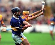 12 August 2001; Paul Kelly of Tipperary in action against Michael Jordan of Wexford during the Guinness All-Ireland Senior Hurling Championship Semi-Final match between Wexford and Tipperary at Croke Park in Dublin. Photo by Damien Eagers/Sportsfile