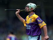 12 August 2001; David O'Connor of Wexford looks for a replacement hurl during the Guinness All-Ireland Senior Hurling Championship Semi-Final match between Wexford and Tipperary at Croke Park in Dublin. Photo by Damien Eagers/Sportsfile