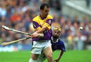 12 August 2001; Darragh Ryan of Wexford in action against Liam Cahill of Tipperary during the Guinness All-Ireland Senior Hurling Championship Semi-Final match between Wexford and Tipperary at Croke Park in Dublin. Photo by Damien Eagers/Sportsfile