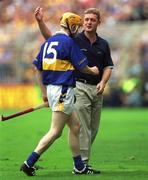 12 August 2001; Tipperary manager Nicky English congratulates Lar Corbett after he was substituted during the Guinness All-Ireland Senior Hurling Championship Semi-Final match between Wexford and Tipperary at Croke Park in Dublin. Photo by Damien Eagers/Sportsfile
