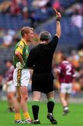 11 August 2001; Graham Geraghty of Meath is shown a yellow card by referee Paddy Russell during the Bank of Ireland All-Ireland Senior Football Championship Quarter-Final Replay match between Meath and Westmeath at Croke Park in Dublin. Photo by Aoife Rice/Sportsfile