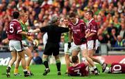 11 August 2001; Referee Paddy Russell attempts to separate Graham Geraghty of Meath and David O'Shaughnessy of Westmeath during the Bank of Ireland All-Ireland Senior Football Championship Quarter-Final Replay match between Meath and Westmeath at Croke Park in Dublin. Photo by Aoife Rice/Sportsfile