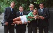 15 August 2001; Ireland rugby Internationals, from left, Malcolm O'Kelly, Brian O'Driscoll, Denis Hickie, and Shane Horgan with model Susan Mitton at the launch of the new Ireland rugby jersey, made by Canterbury of New Zealand, in Dublin. Photo by Brendan Moran/Sportsfile