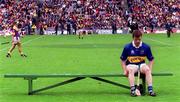 12 August 2001; David Kennedy awaits for his Tipperary team-mates to join him for the team photograph prior to the Guinness All-Ireland Senior Hurling Championship Semi-Final match between Wexford and Tipperary at Croke Park in Dublin. Photo by Ray McManus/Sportsfile