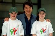 16 August 2001; Movie Star Jackie Chan took a break from filming his latest film today to drop into the Clarion Hotel in Dublin's IFSC to give some training tips to Special Olympics athletes Aisling O'Brien from Sandycove and Jonathon Kirkpatrick from Deansgrange who are preparing for the 2003 Special Olympics World Summer Games. Photo by Ray McManus/Sportsfile