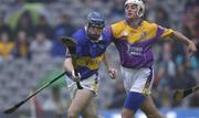 18 August 2001; Eoin Kelly of Tipperary in action against Declan Ruth of Wexford during the Guinness All-Ireland Senior Hurling Championship Semi-Final Replay match between Wexford and Tipperary at Croke Park in Dublin. Photo by Brendan Moran/Sportsfile