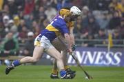 18 August 2001; Eamonn Corcoran of Tipperary in action against Paul Codd of Wexford during the Guinness All-Ireland Senior Hurling Championship Semi-Final Replay match between Wexford and Tipperary at Croke Park in Dublin. Photo by Brendan Moran/Sportsfile