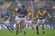 18 August 2001; John Carroll of Tipperary in action against Liam Dunne of Wexford during the Guinness All-Ireland Senior Hurling Championship Semi-Final Replay match between Wexford and Tipperary at Croke Park in Dublin. Photo by Brendan Moran/Sportsfile
