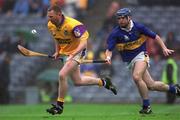 18 August 2001; Wexford goalkeeper Damien Fitzhenry runs past Eoin Kelly of Tipperary during the Guinness All-Ireland Senior Hurling Championship Semi-Final Replay match between Wexford and Tipperary at Croke Park in Dublin. Photo by Ray McManus/Sportsfile