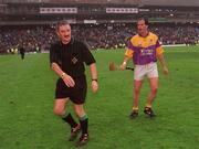 18 August 2001; Adrian Fenlon of Wexford remonstrates  with referee Pat Horan after the Guinness All-Ireland Senior Hurling Championship Semi-Final Replay match between Wexford and Tipperary at Croke Park in Dublin. Photo by Brendan Moran/Sportsfile