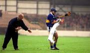 18 August 2001; Eoin Kelly of Tipperary wipes his hands with a towel before taking a free during the Guinness All-Ireland Senior Hurling Championship Semi-Final Replay match between Wexford and Tipperary at Croke Park in Dublin. Photo by Brian Lawless/Sportsfile