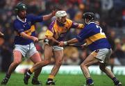 18 August 2001; Martin Storey of Wexford in action against Thomas Costello, right, and David Kennedy of Tipperary during the Guinness All-Ireland Senior Hurling Championship Semi-Final Replay match between Wexford and Tipperary at Croke Park in Dublin. Photo by Ray McManus/Sportsfile