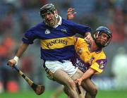 18 August 2001; Thomas Costello of Tipperary in action against Barry Lambert of Wexford during the Guinness All-Ireland Senior Hurling Championship Semi-Final Replay match between Wexford and Tipperary at Croke Park in Dublin. Photo by Ray McManus/Sportsfile