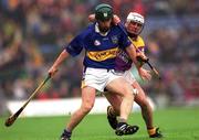 18 August 2001; David Kennedy of Tipperary in action against Paul Codd of Wexford during the Guinness All-Ireland Senior Hurling Championship Semi-Final Replay match between Wexford and Tipperary at Croke Park in Dublin. Photo by Ray McManus/Sportsfile
