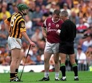 19 August 2001; Referee Pat O'Connor with Henry Shefflin of Kilkenny and Gregory Kennedy of Galway before showing them both the yellow card during the Guinness All-Ireland Senior Hurling Championship Semi-Final match between Kilkenny and Galway at Croke Park in Dublin. Photo by Ray McManus/Sportsfile