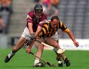 19 August 2001; Andy Comerford of Kilkenny is tackled by Cathal Moore of Galway during the Guinness All-Ireland Senior Hurling Championship Semi-Final match between Kilkenny and Galway at Croke Park in Dublin. Photo by Brendan Moran/Sportsfile
