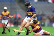18 August 2001; Mark O'Leary of Tipperary in action against Darren Stamp of Wexford during the Guinness All-Ireland Senior Hurling Championship Semi-Final Replay match between Wexford and Tipperary at Croke Park in Dublin. Photo by Ray McManus/Sportsfile
