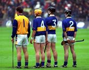 18 August 2001; Tipperary players, from left, Brendan Cummins, Thomas Costello, Philip Maher and Paul Ormonde stand for the national anthem prior to the Guinness All-Ireland Senior Hurling Championship Semi-Final Replay match between Wexford and Tipperary at Croke Park in Dublin. Photo by Brian Lawless/Sportsfile