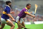 18 August 2001; Larry O'Gorman of Wexford in action against Philip Maher of Tipperary during the Guinness All-Ireland Senior Hurling Championship Semi-Final Replay match between Wexford and Tipperary at Croke Park in Dublin. Photo by Brian Lawless/Sportsfile