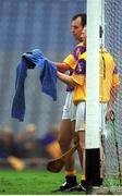 18 August 2001; Wexford players Darragh Ryan and his goalkeeper Damien Fitzhenry dry their hurls with a towel during the Guinness All-Ireland Senior Hurling Championship Semi-Final Replay match between Wexford and Tipperary at Croke Park in Dublin. Photo by Ray McManus/Sportsfile