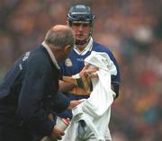 18 August 2001; Eoin Kelly of Tipperary wipes his hands with a towel before taking a free during the Guinness All-Ireland Senior Hurling Championship Semi-Final Replay match between Wexford and Tipperary at Croke Park in Dublin. Photo by Brendan Moran/Sportsfile