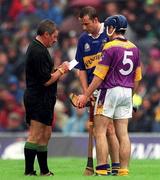 18 August 2001; Referee Pat Horan takes the names of Liam Dunne of Wexford and Brian O'Meara of Tipperary before sending them both off during the Guinness All-Ireland Senior Hurling Championship Semi-Final Replay match between Wexford and Tipperary at Croke Park in Dublin. Photo by Ray McManus/Sportsfile